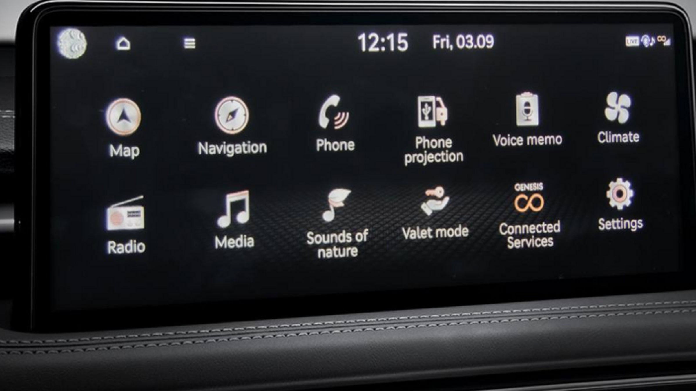 The Genesis G70's infotainment screen showing the main menu with various options like navigation and media.