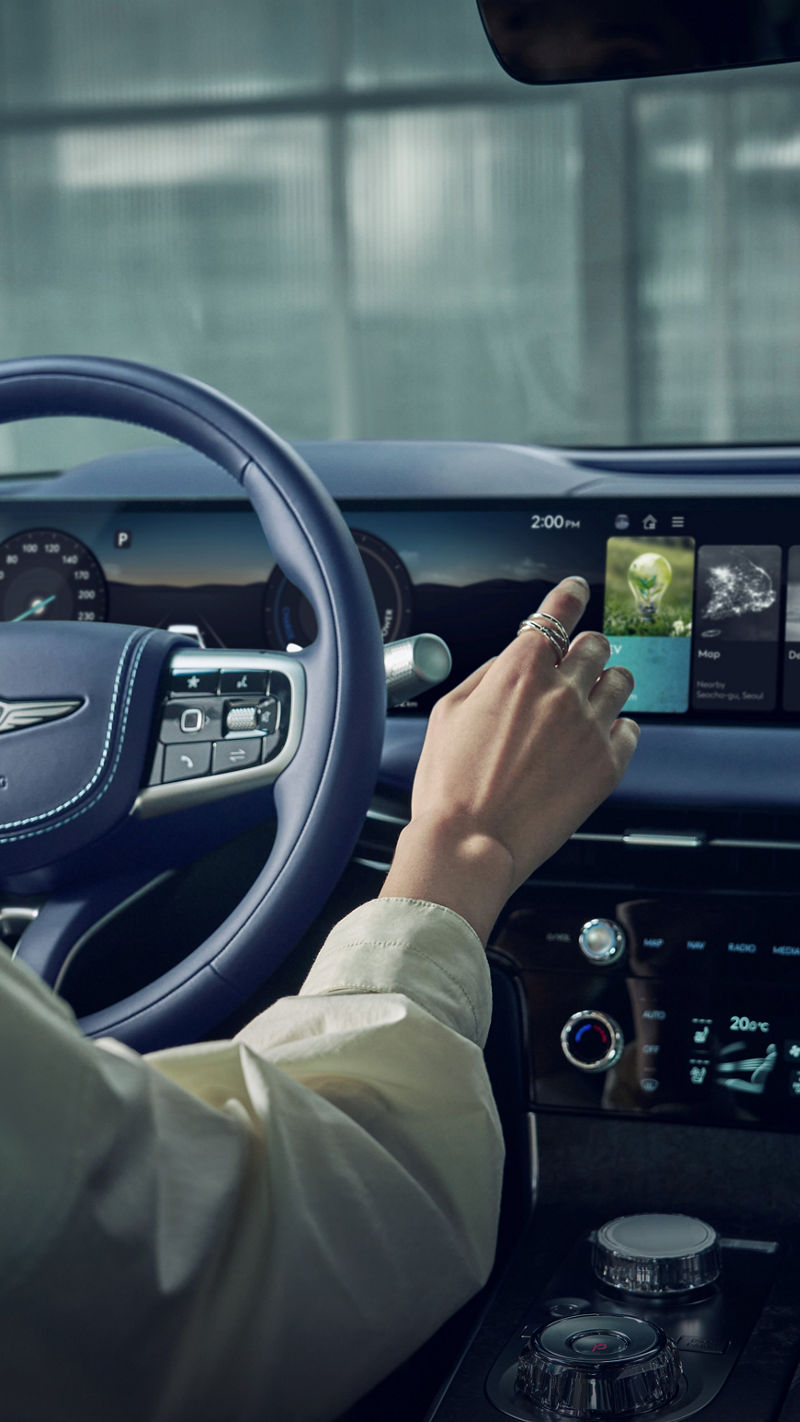 High-resolution image showcasing the unique exterior design and elements of the Genesis Electrified G80 luxury sedan.