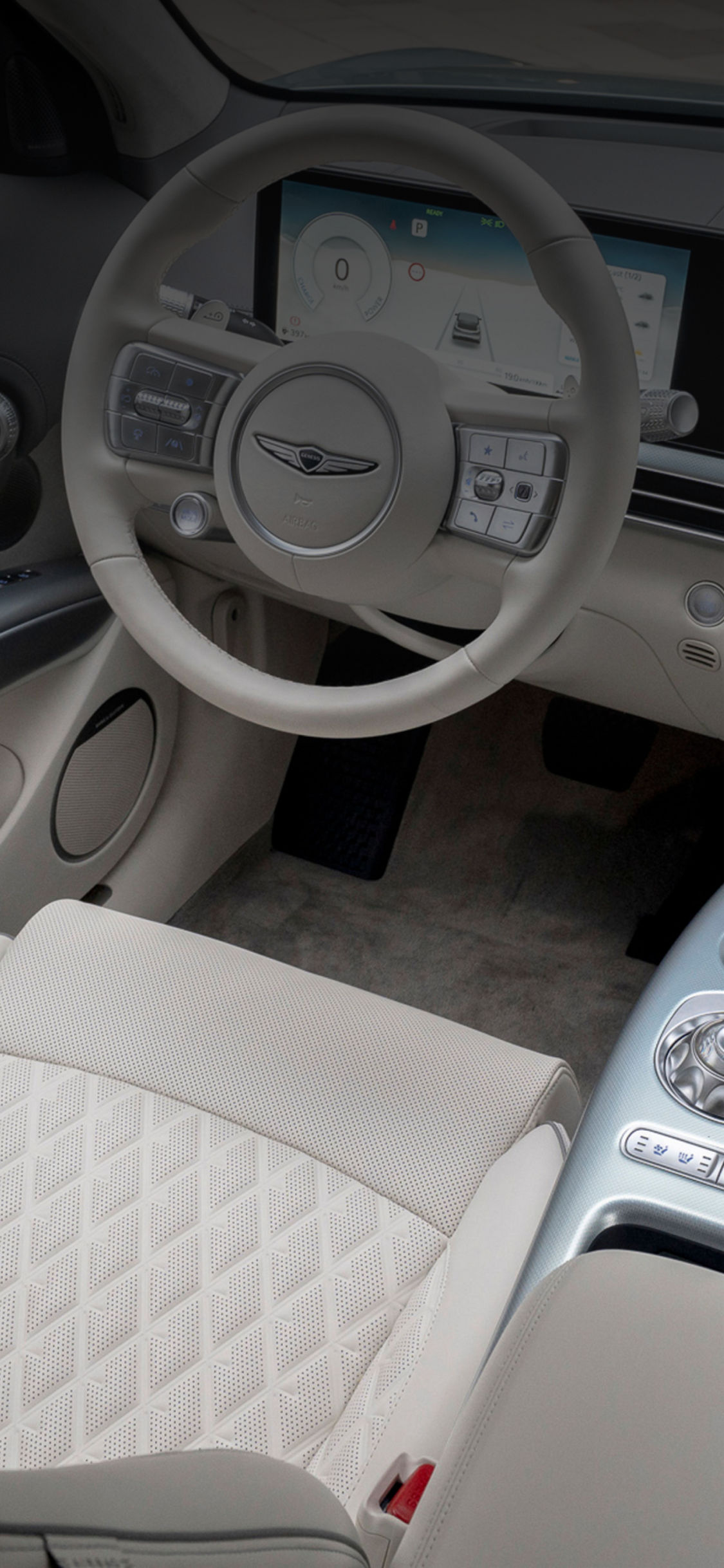 The interior of a Genesis vehicle showcasing the beauty of white space, with a clean and minimalist design.