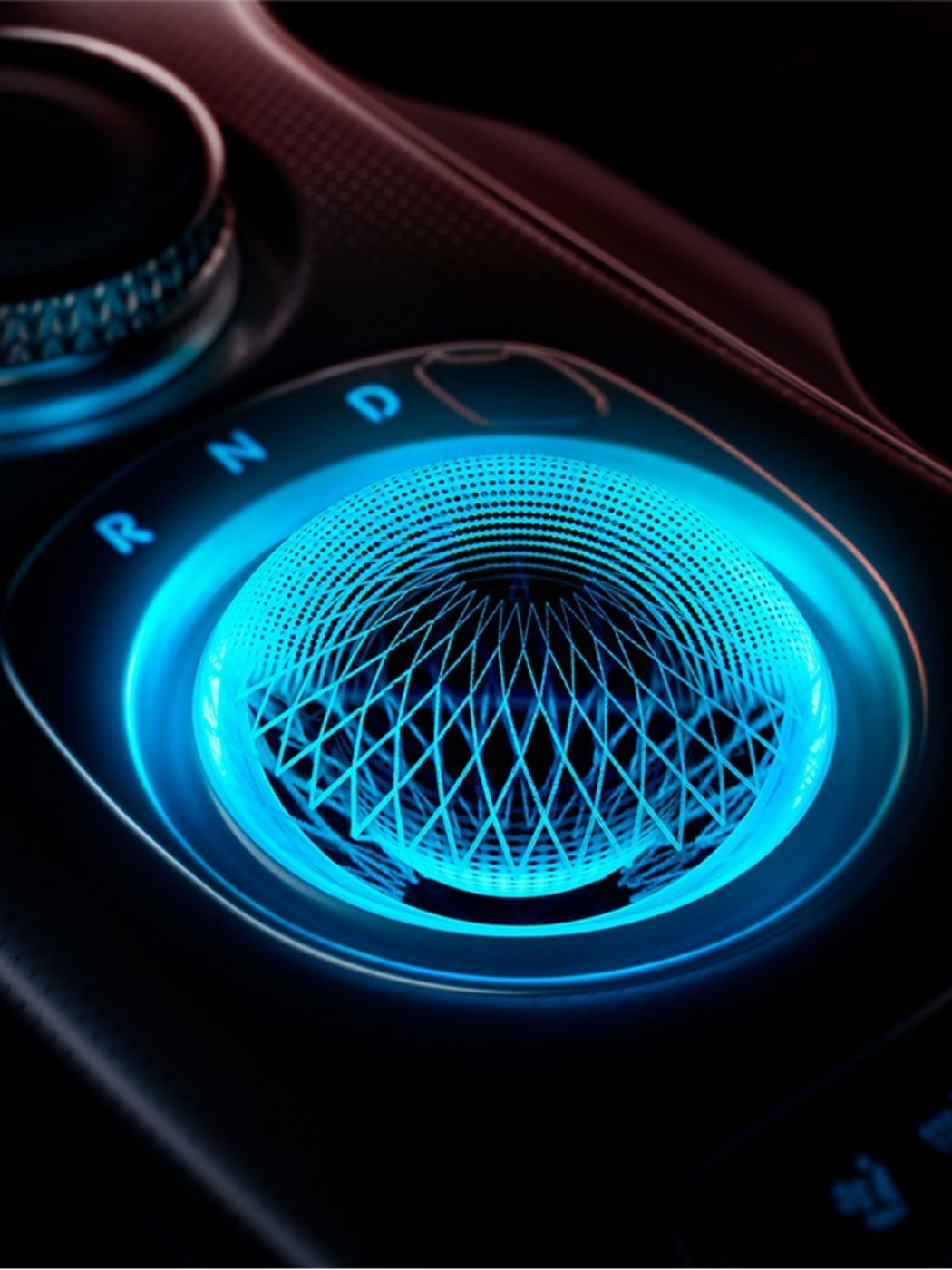 The Crystal Sphere in the GV60, glowing softly when off and rotating to reveal the rotary gear selector when the vehicle is ready.