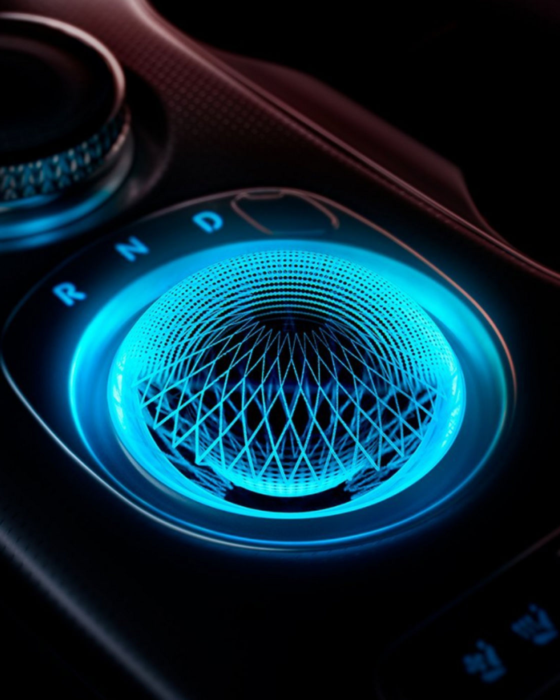 The Crystal Sphere in the GV60, glowing softly when off and rotating to reveal the rotary gear selector when the vehicle is ready.