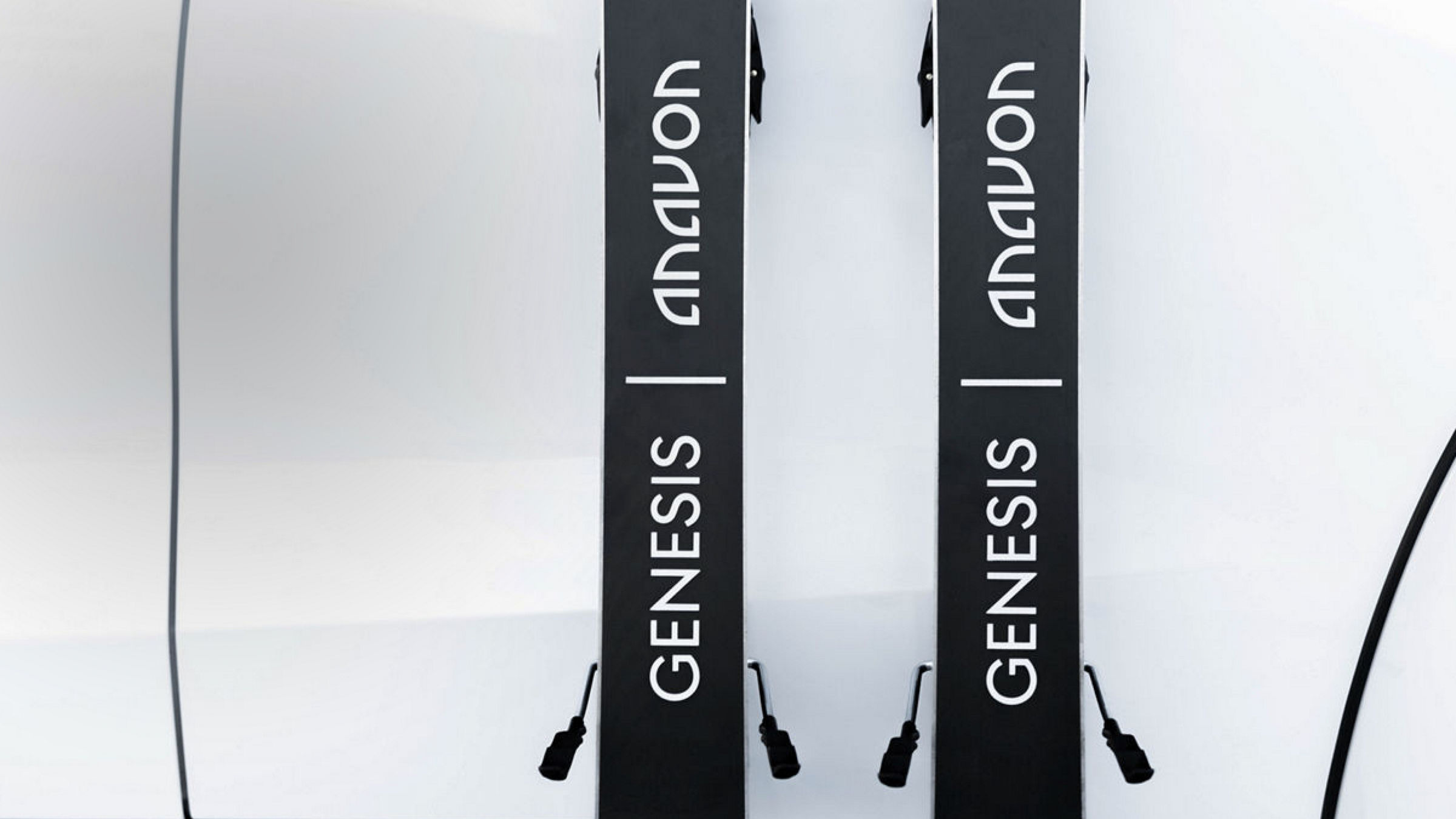 A pair of skis with Genesis lettering