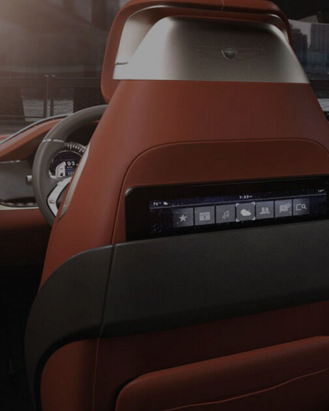 Rear seat display on the Genesis GV80 Concept showing a sleek infotainment screen