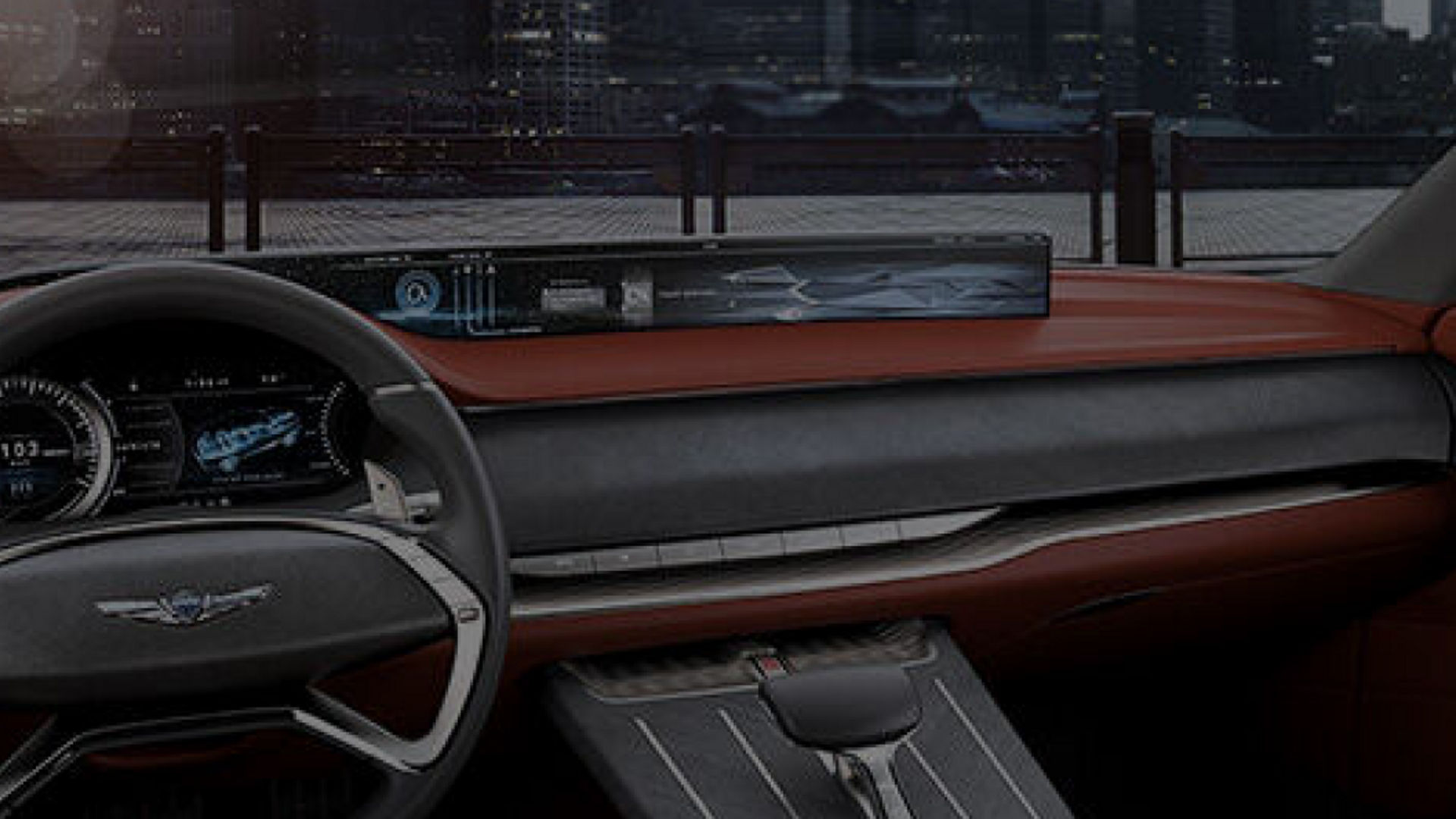 Interior of the Genesis GV80 Concept showcasing a futuristic dashboard and steering wheel.