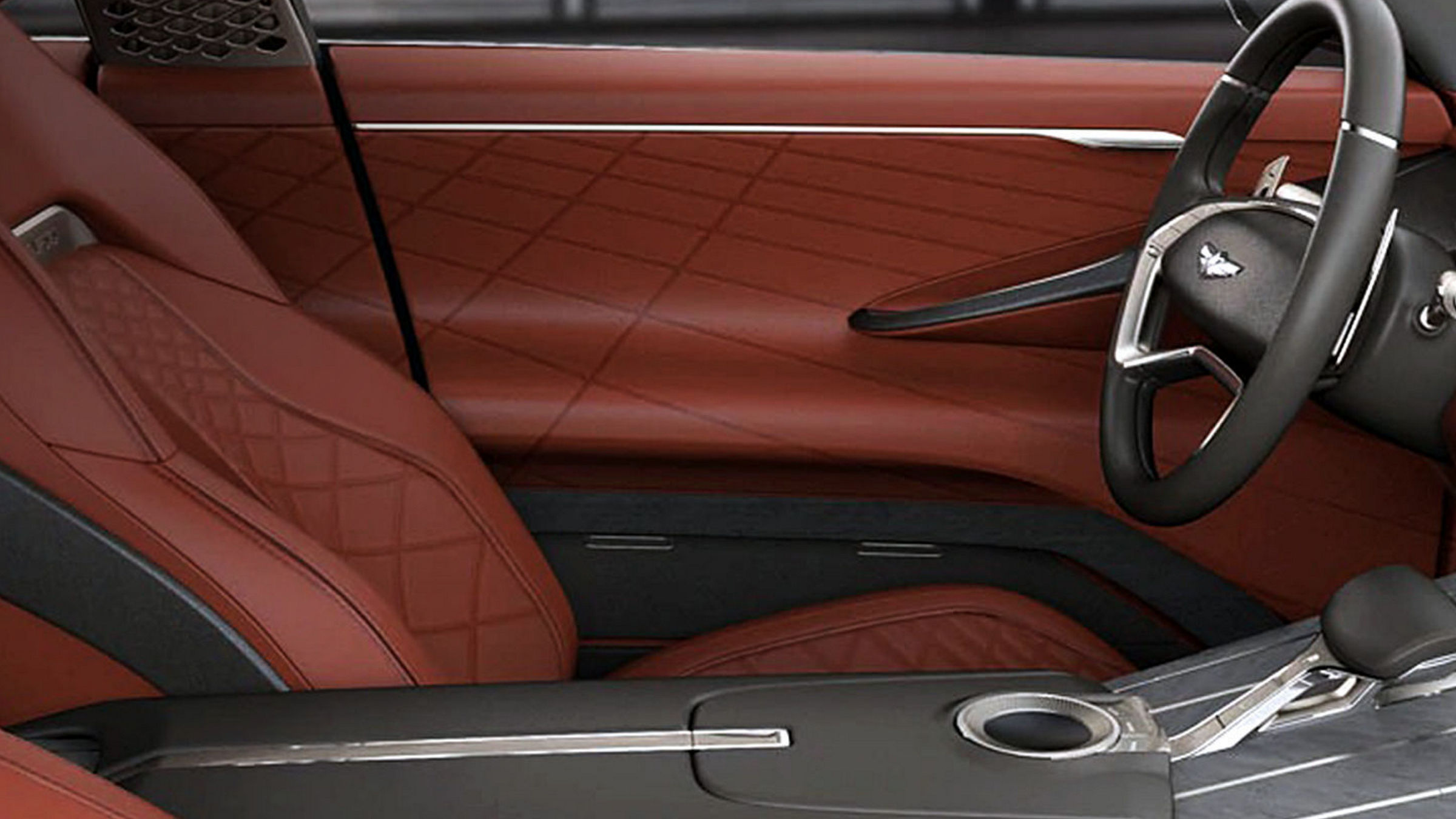 Interior of the Genesis GV80 Concept with quilted leather seats and a modern steering wheel