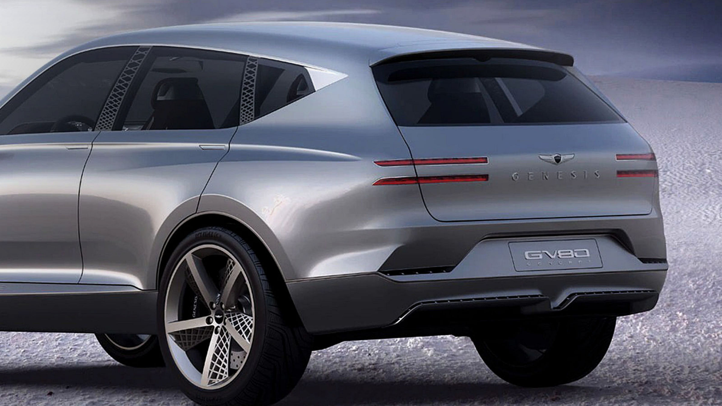 Rear-side view of the Genesis GV80 Concept showcasing its sleek lines and modern taillights