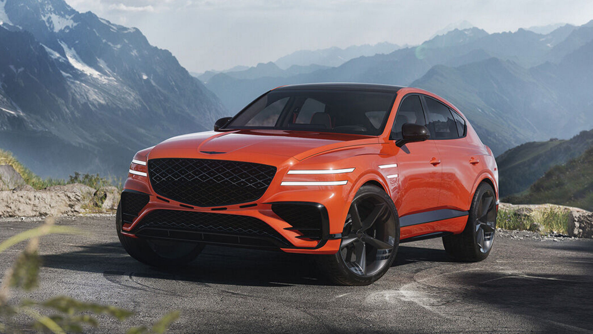 Genesis GV80 Coupe from the front with mountains in the background