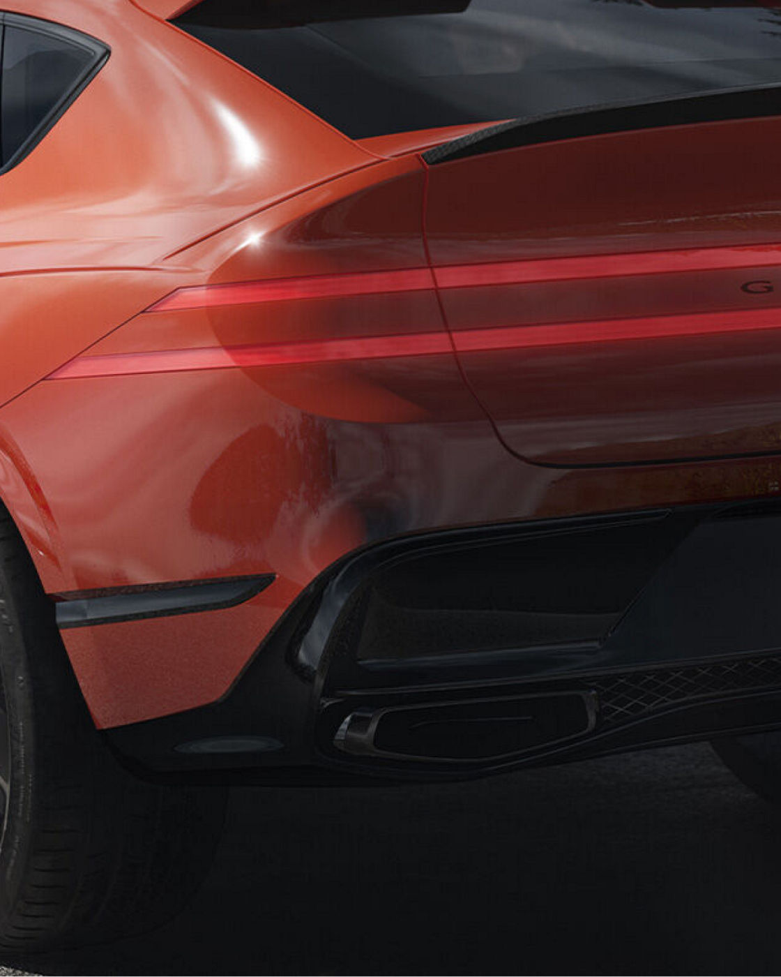 Rear view of the GV80 Coupe Concept with illuminated taillights