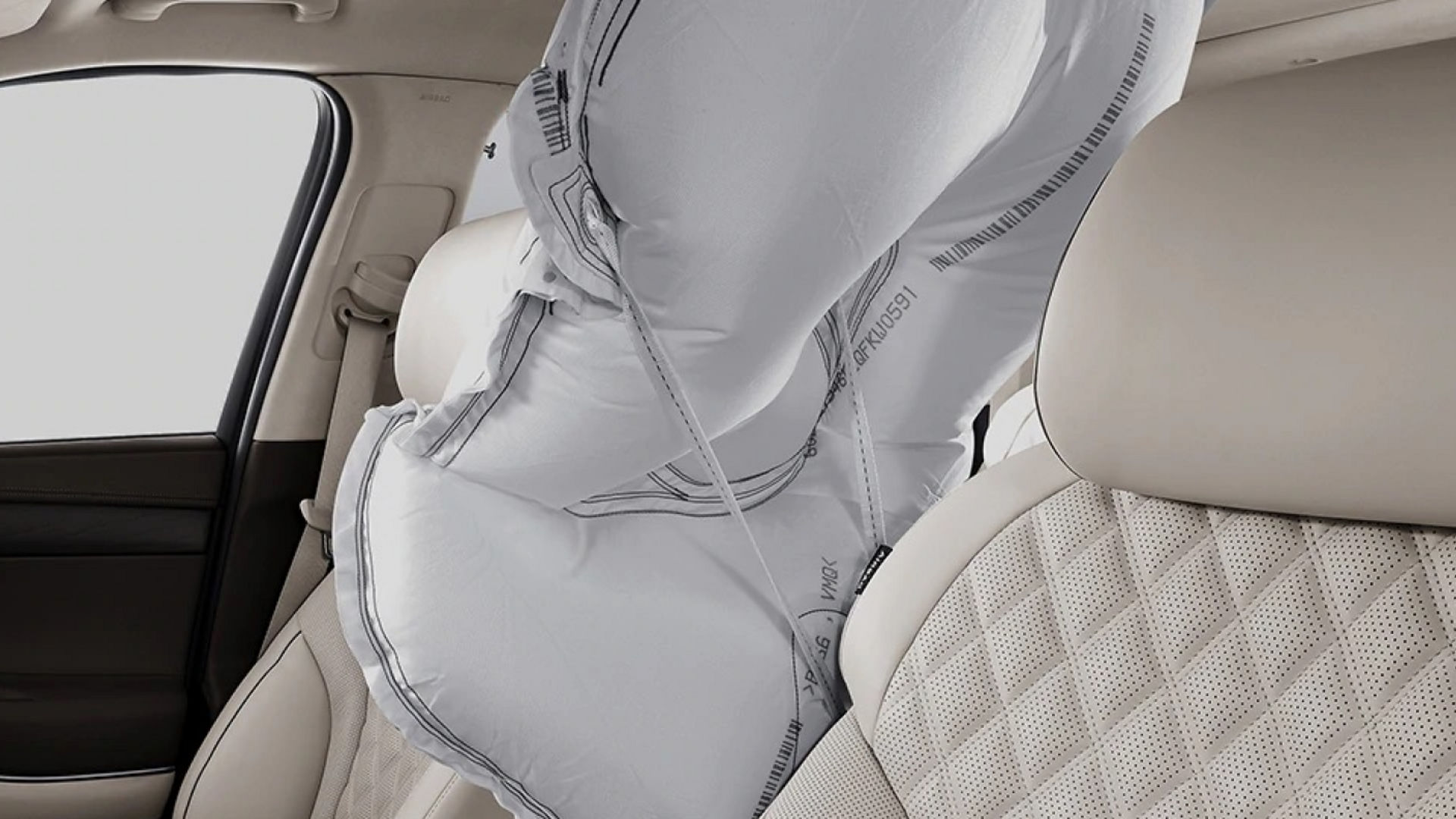 Side airbags deployed inside the Genesis GV80, showcasing advanced passenger safety features.