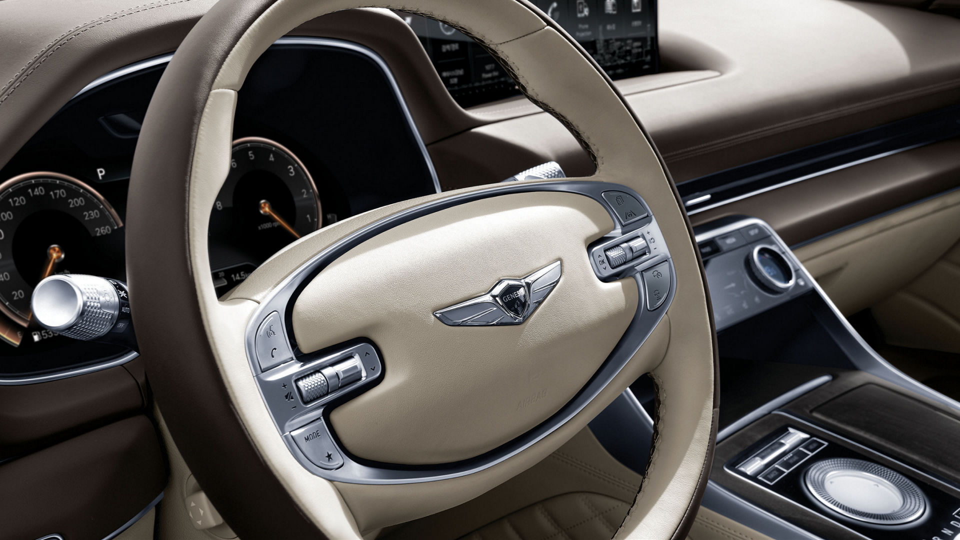 enclosed in elegant and luxurious details, delicate stitching and a handsome Genesis emblem. 