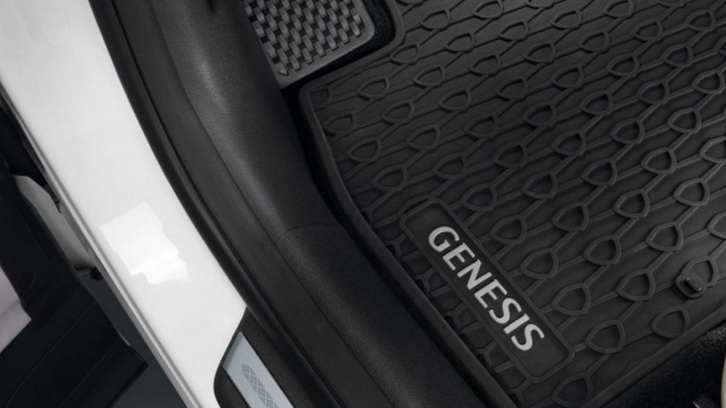 Genesis GV80 - detail of the footwell with a weatherproof floor mat.