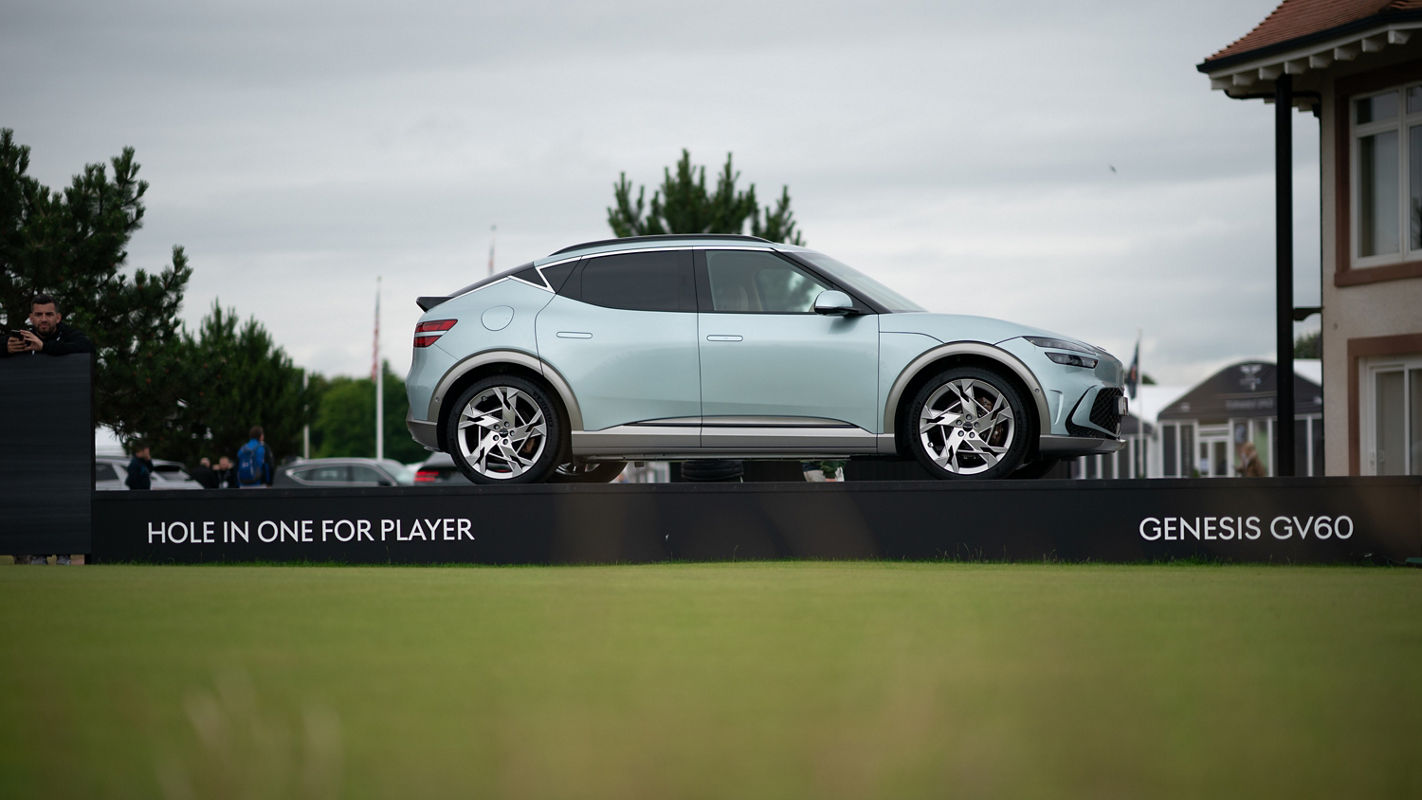 Mint green Genesis GV60 at the Genesis Scottish Open golf tournament