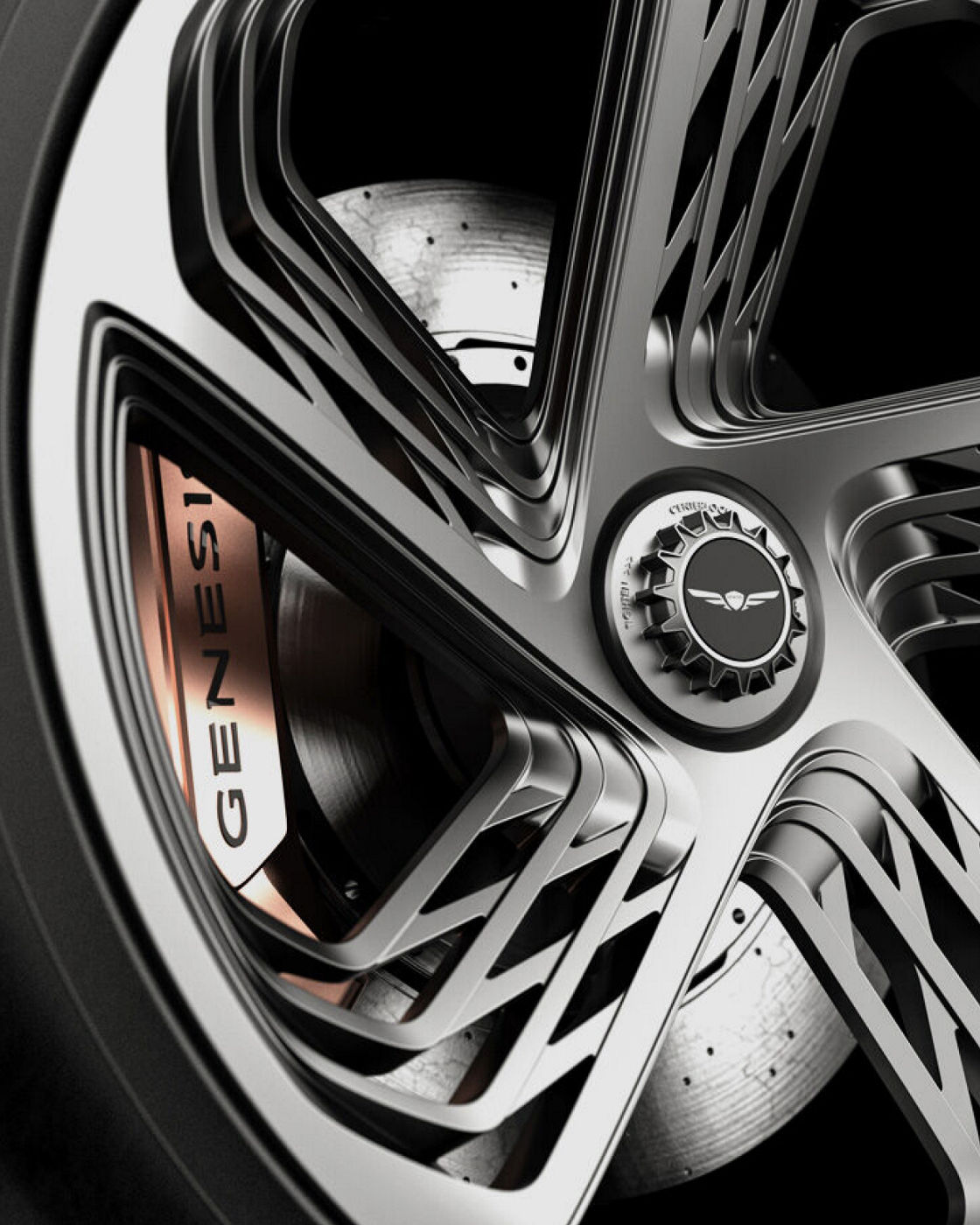 Close-up of the Genesis Mint Concept's intricate alloy wheel design, highlighting luxury and innovation