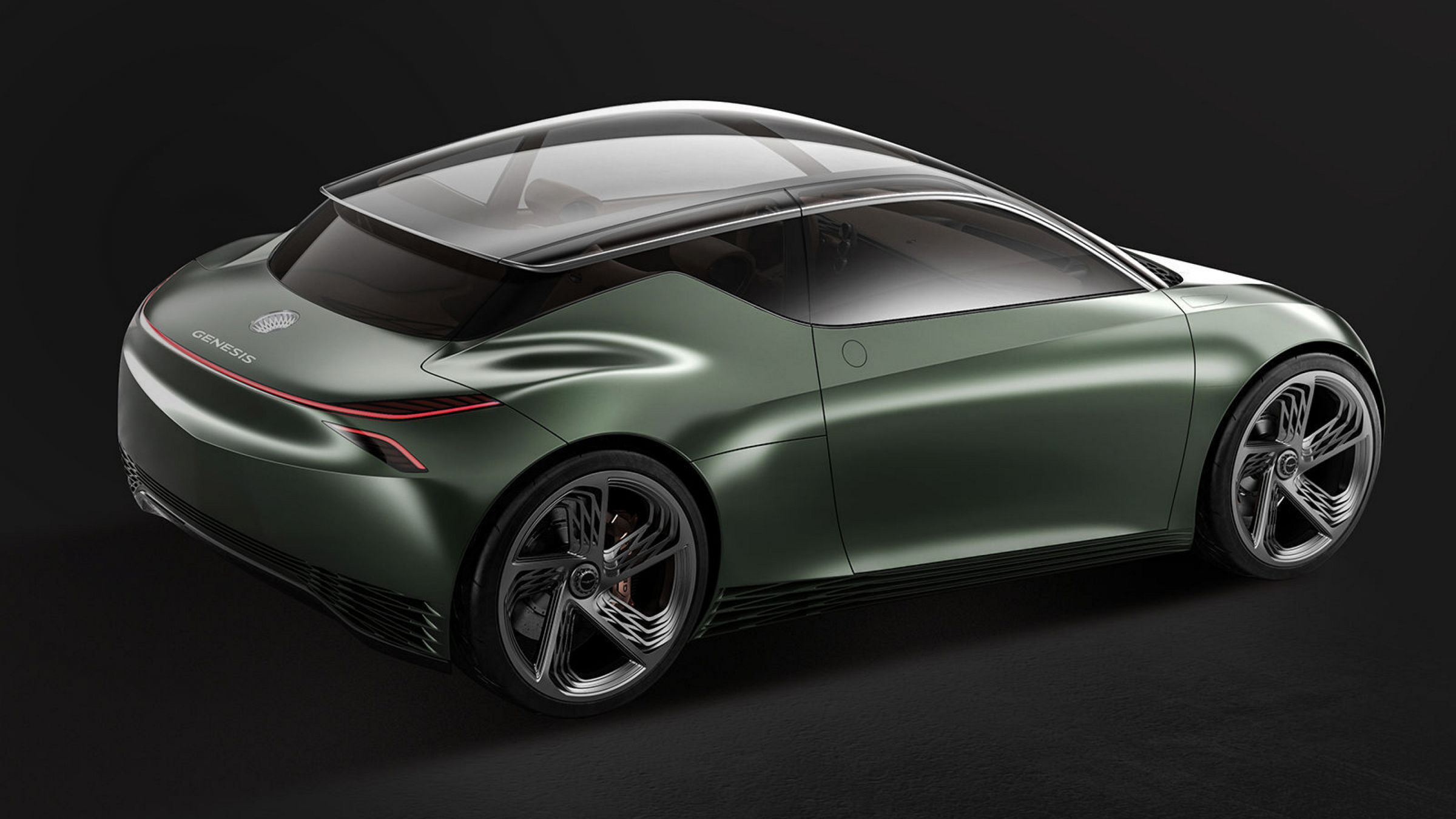 Rear view of the Genesis Mint Concept, featuring a sleek, futuristic design with a panoramic glass roof