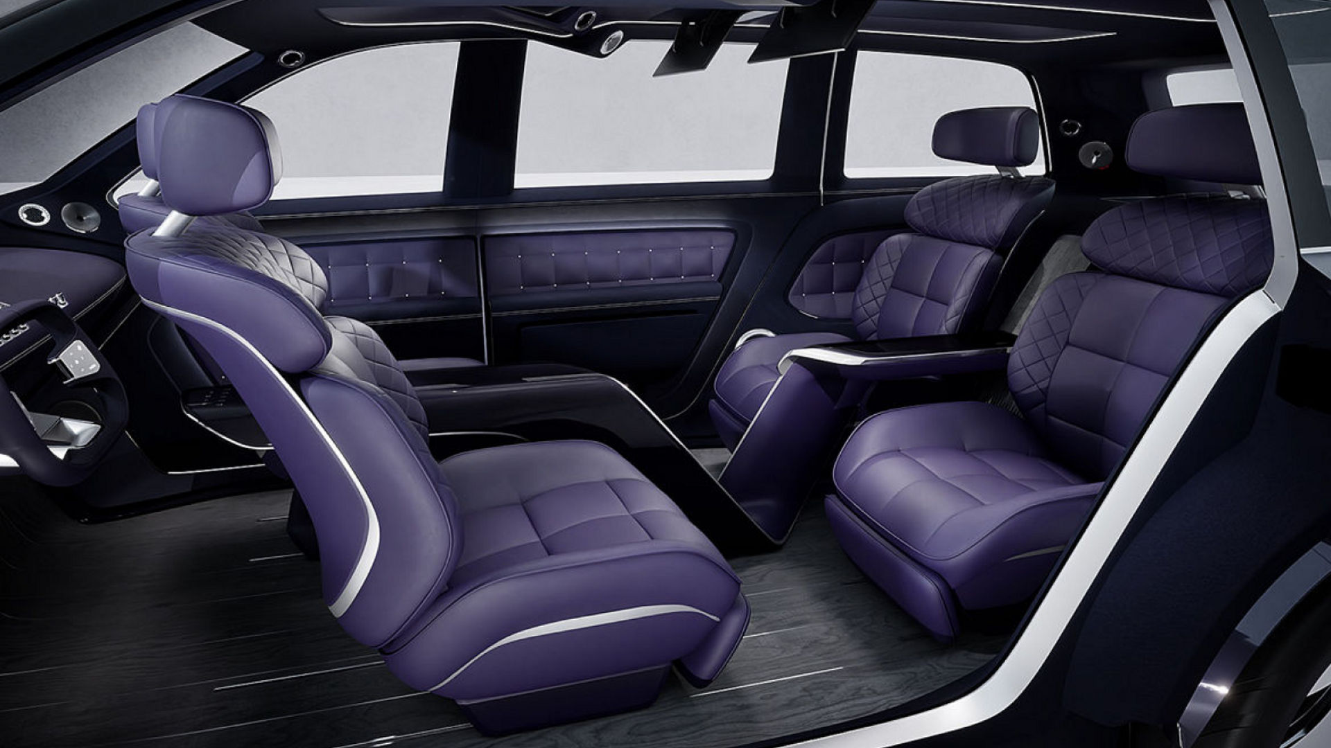 The Genesis Neolun Concept's interior is viewed from the side, with the front. seat turned to face the rear seat