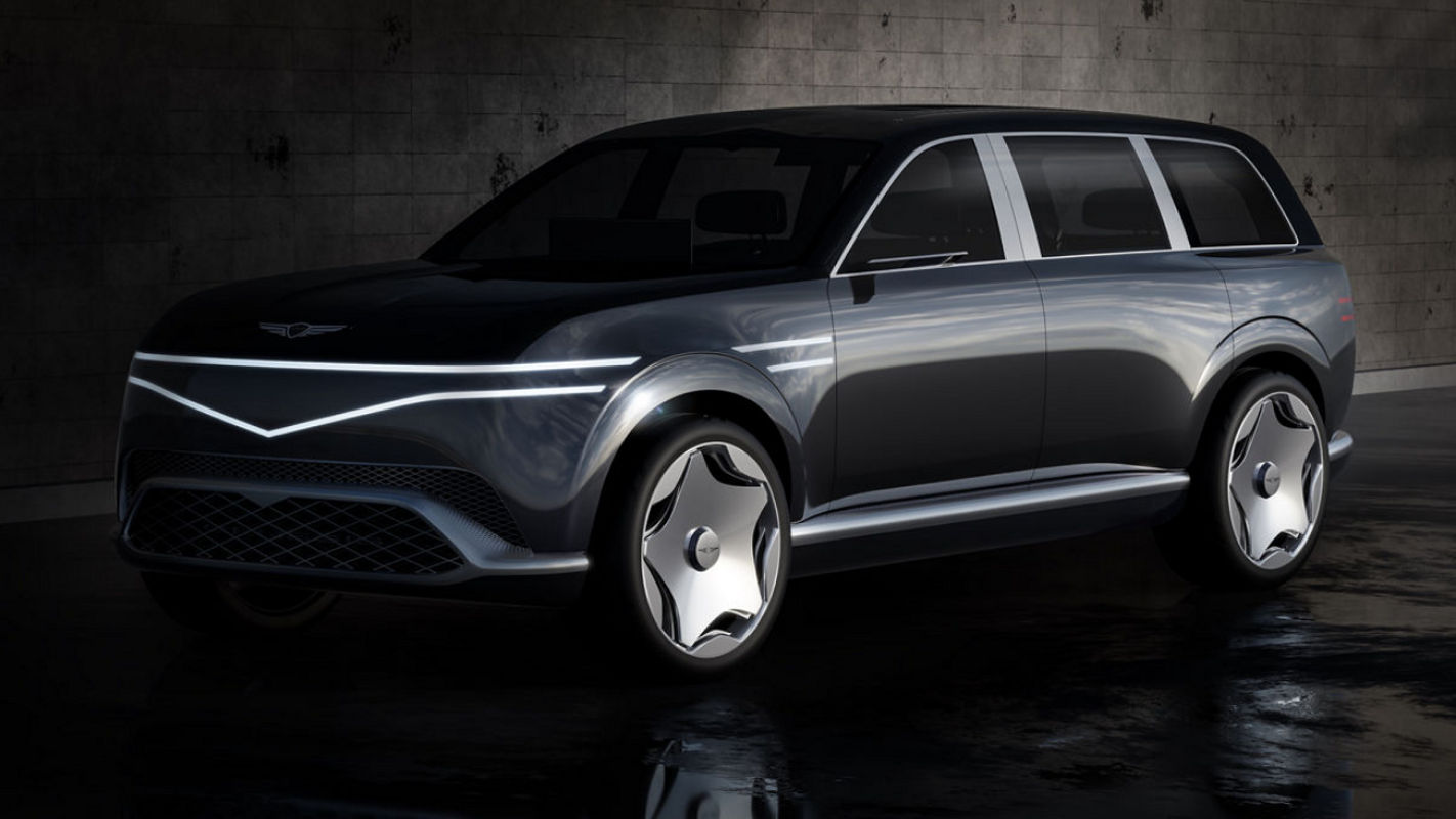 The Genesis Neolun Concept is parked diagonally with its lights on