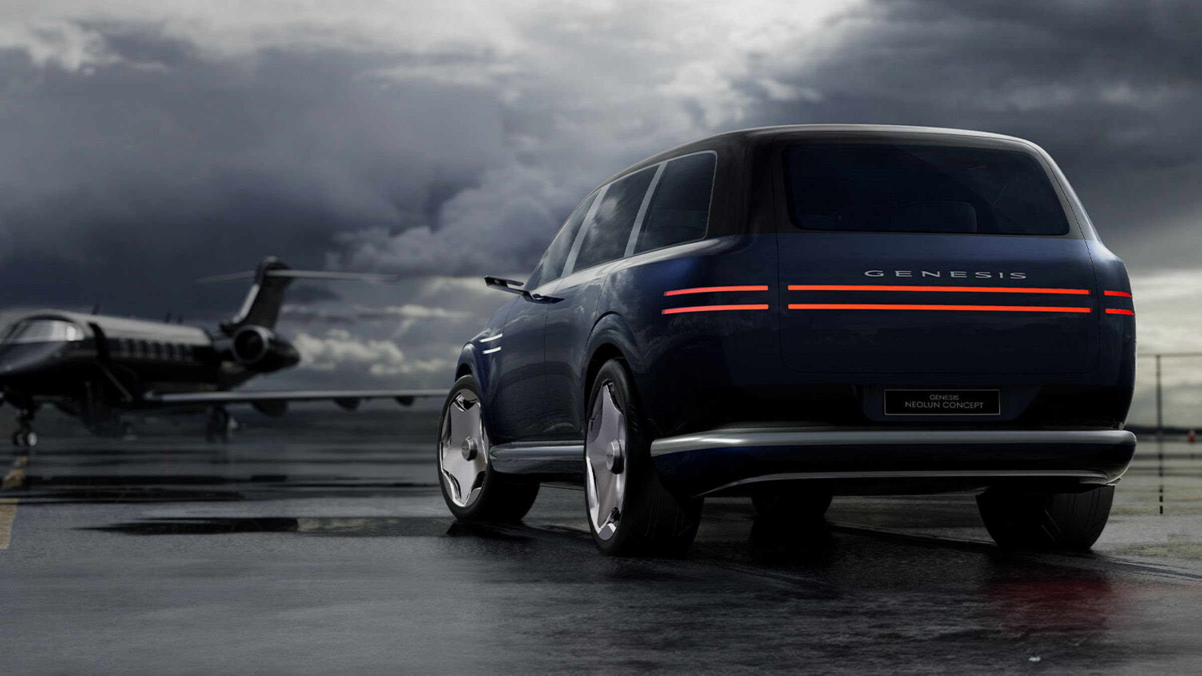 Genesis Vision SUV Neolun concept stands on runway with aeroplane in the background - rear side view