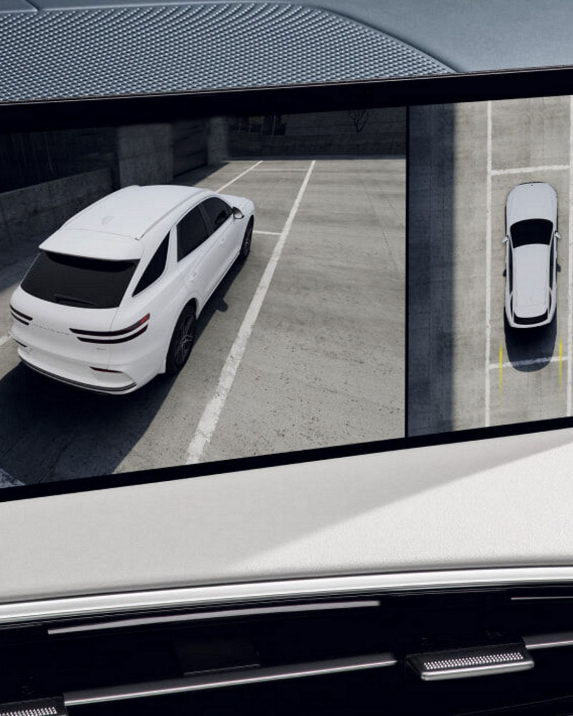 La pantalla interior del Genesis Electrified GV70 muestra una transmisión en directo de su entorno, incluida una vista aérea del propio vehículo.