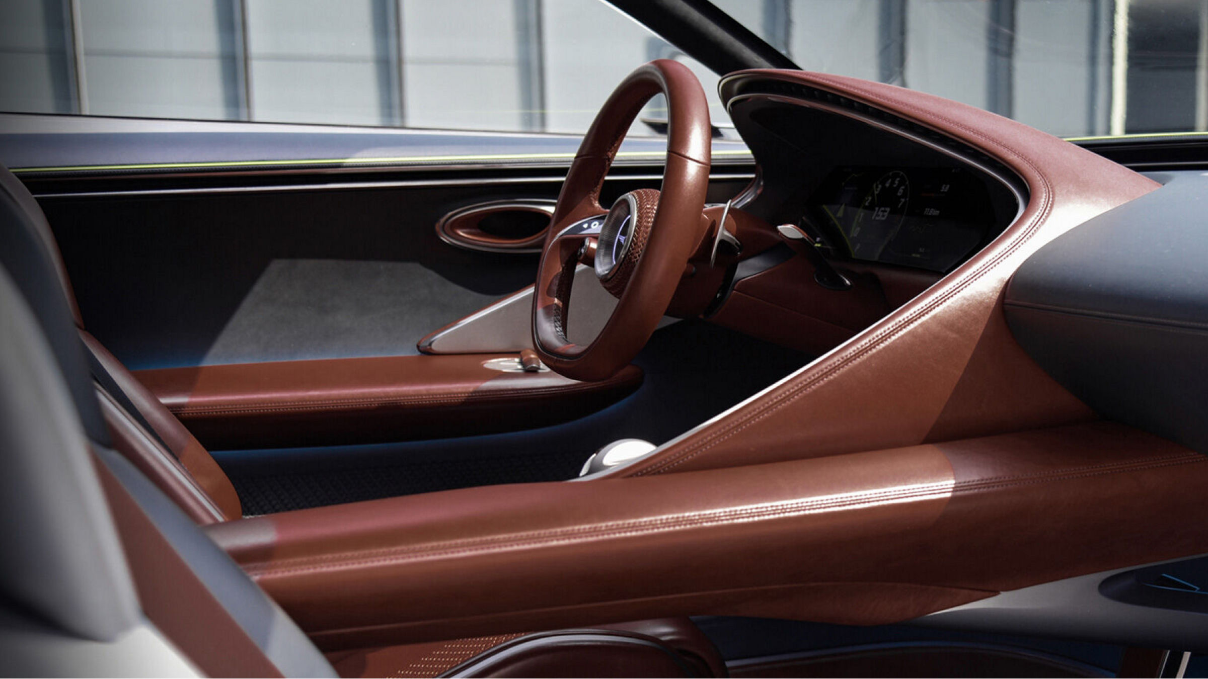 Driver's seat in brown leather in the Genesis X Concept - side view