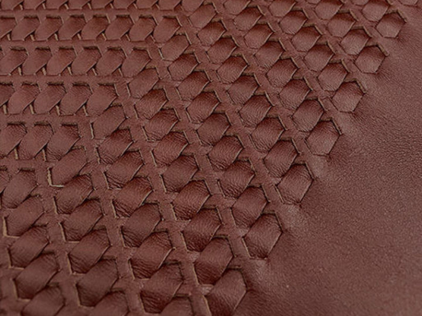 Detail of a brown leather seat cover of the Genesis X Concept