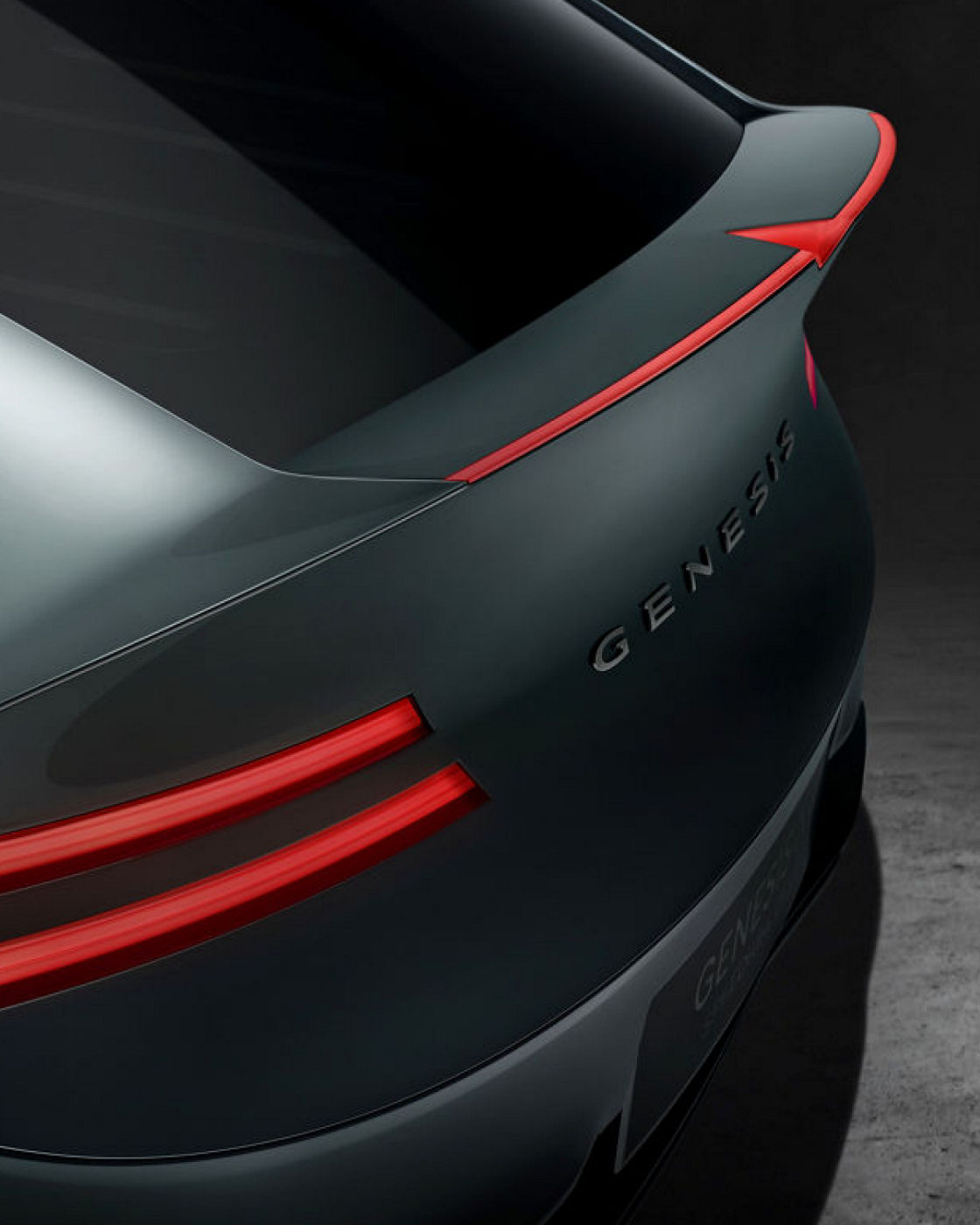 Rear view of the Genesis X Speedium Concept car highlighting the taillight and sleek design.