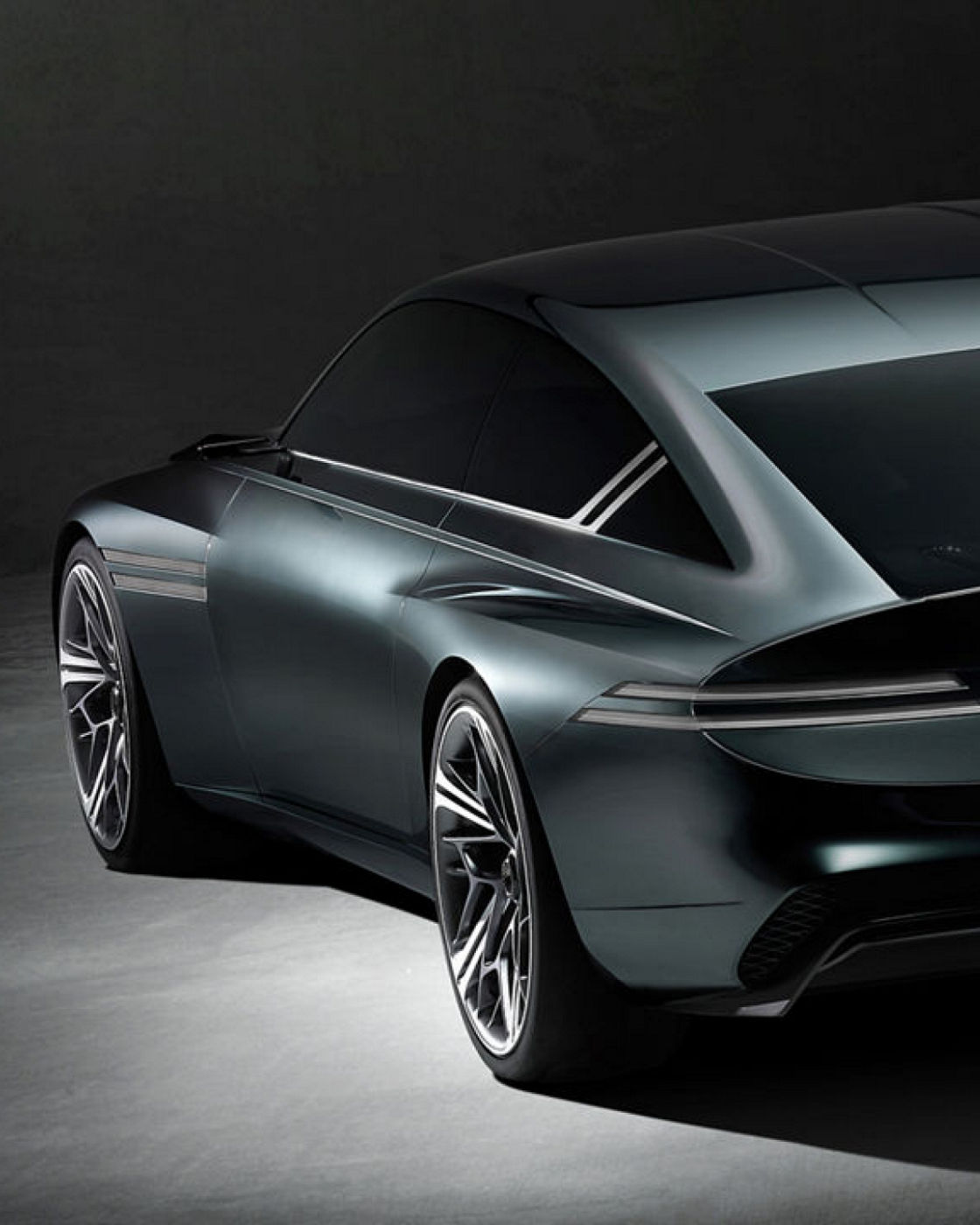 Side rear view of the Genesis X Speedium Concept showcasing sleek curves