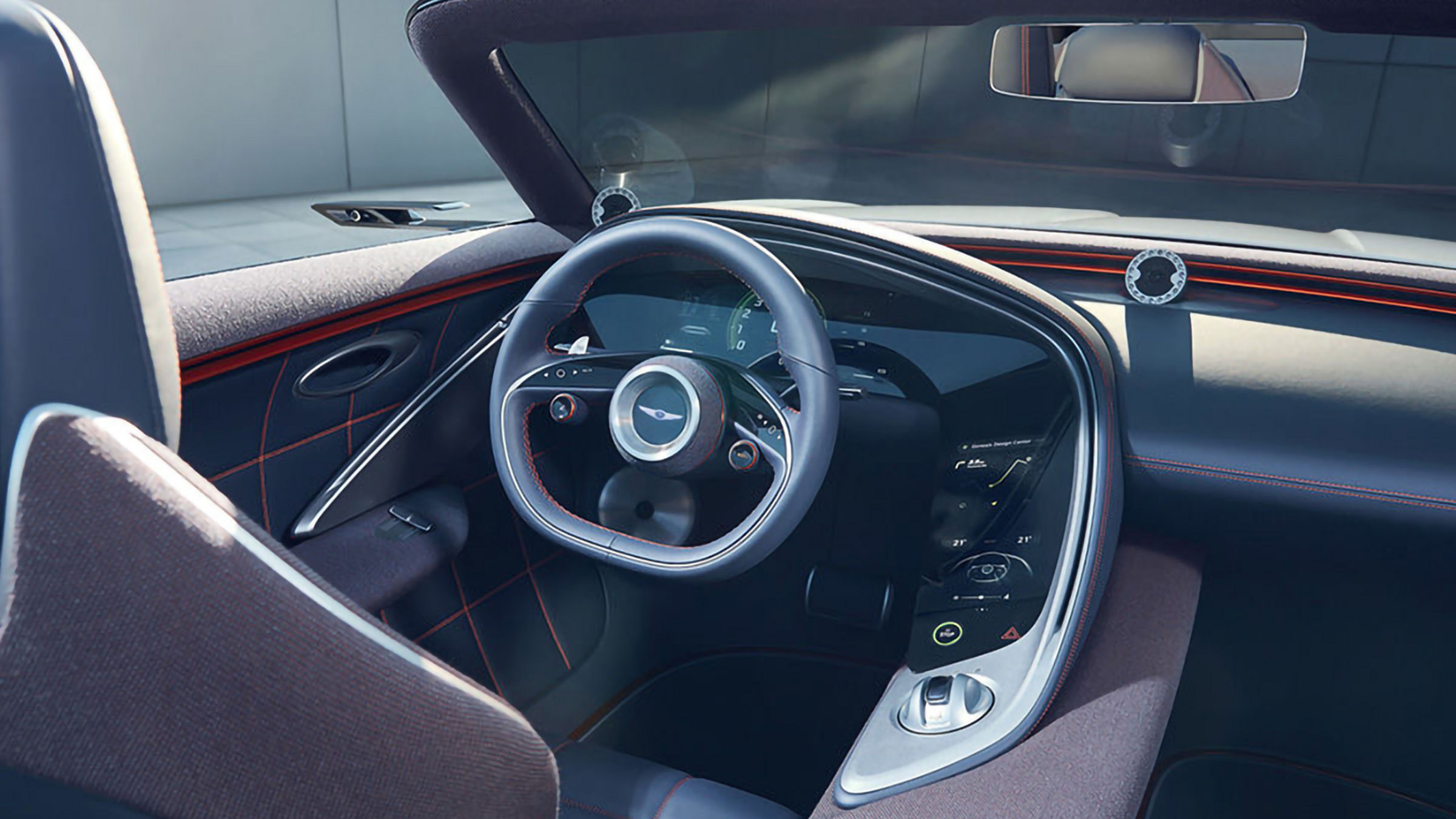 Driver's seat and steering wheel from the Genesis X Convertible with brown-black interior