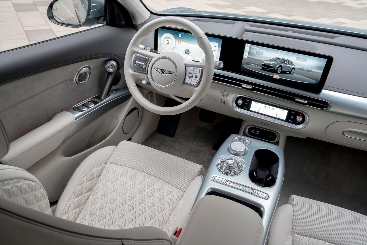Interior view of the Genesis GV60 front seats in Nappa White colour