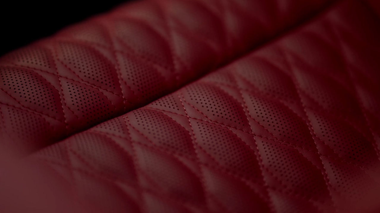 Close-up of leather from car seats in red colour