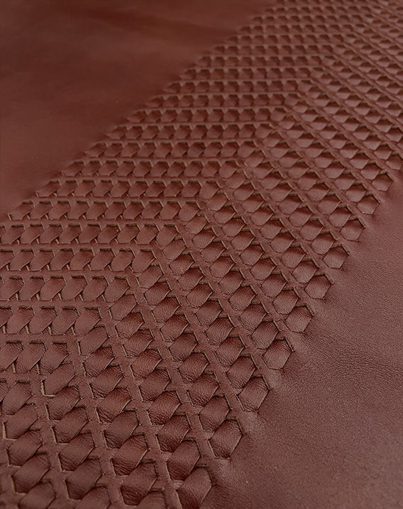 Detail of a brown leather seat cover of the Genesis X Concept