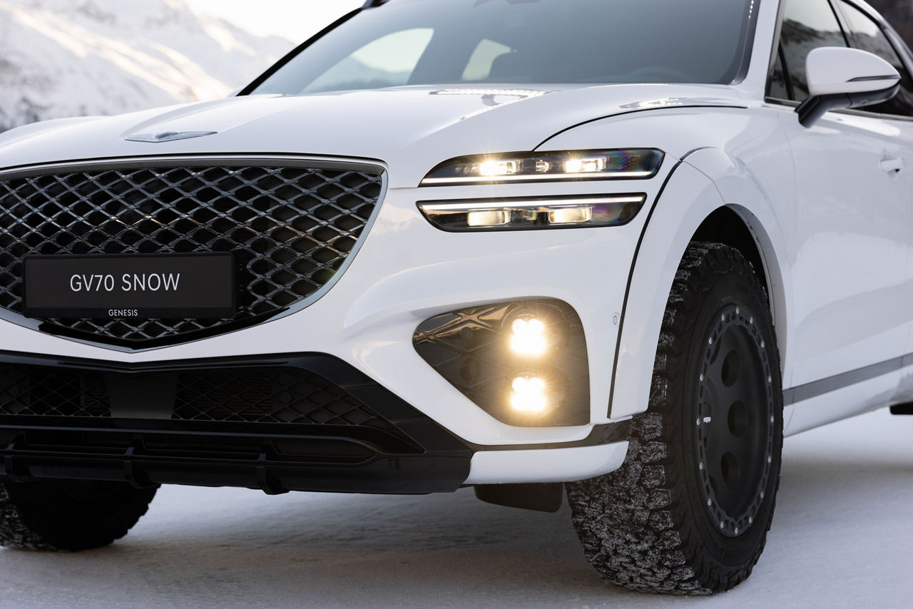 GV70 Snow Concept white outdoor front view details of fog lights