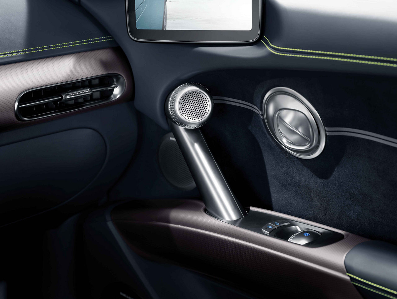 Interior view of the side door of the Genesis GV60 with black interior fittings