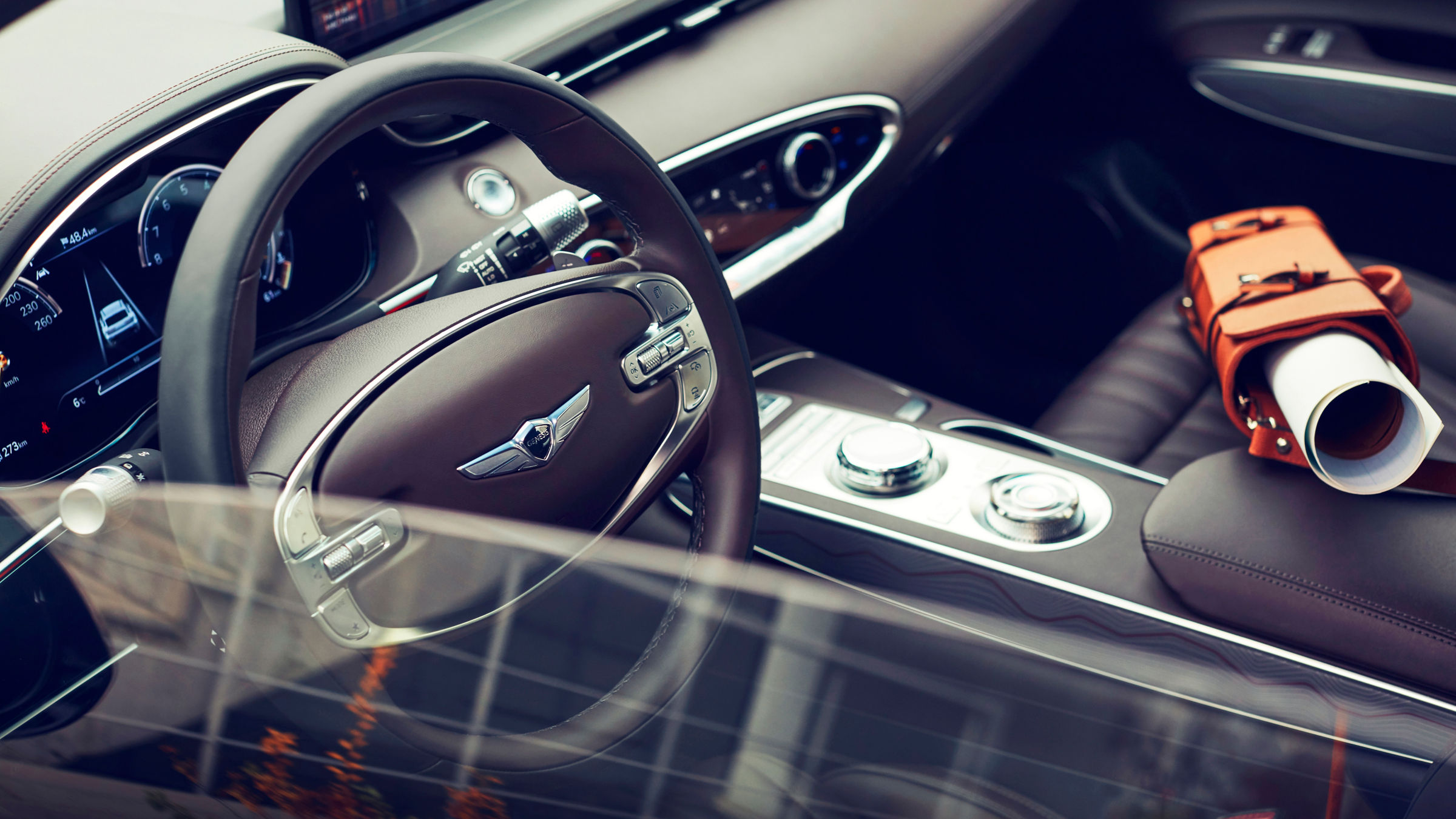 Shot of the front seats of a car through the open window on the driver's side