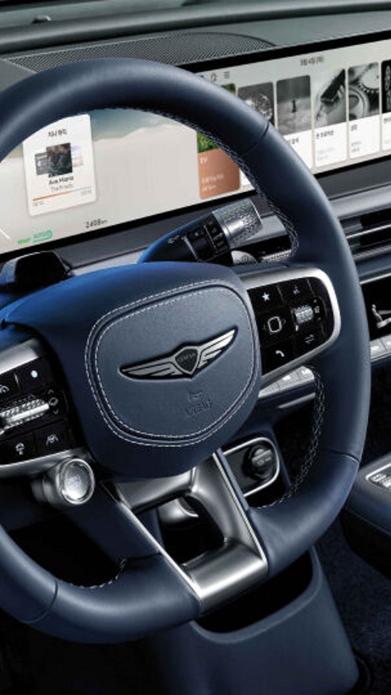 Genesis GV60 Electric Vehicle interior design showing high-tech dashboard and premium seatin