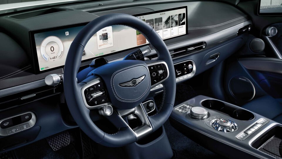Genesis GV60 Electric Vehicle interior design showing high-tech dashboard and premium seatin