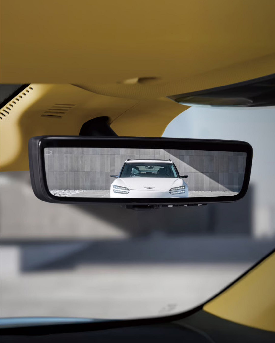 You can see other vehicles driving behind you through the center mirror above the center of the front seat.