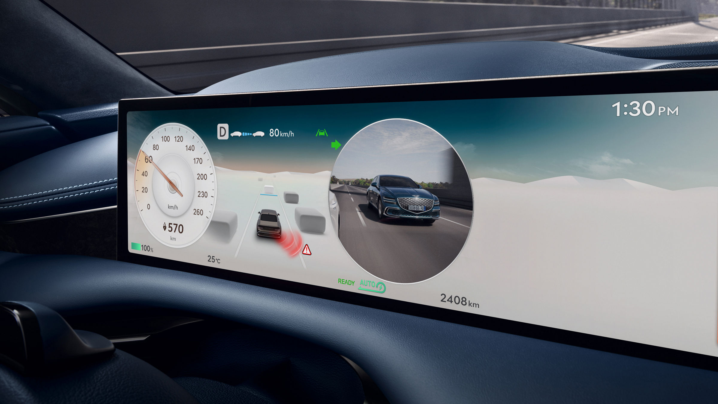 The display in front of the driver's seat shows dashboard graphics, a view of the vehicle from the outside, and a view of the vehicle from behind driving on the road.