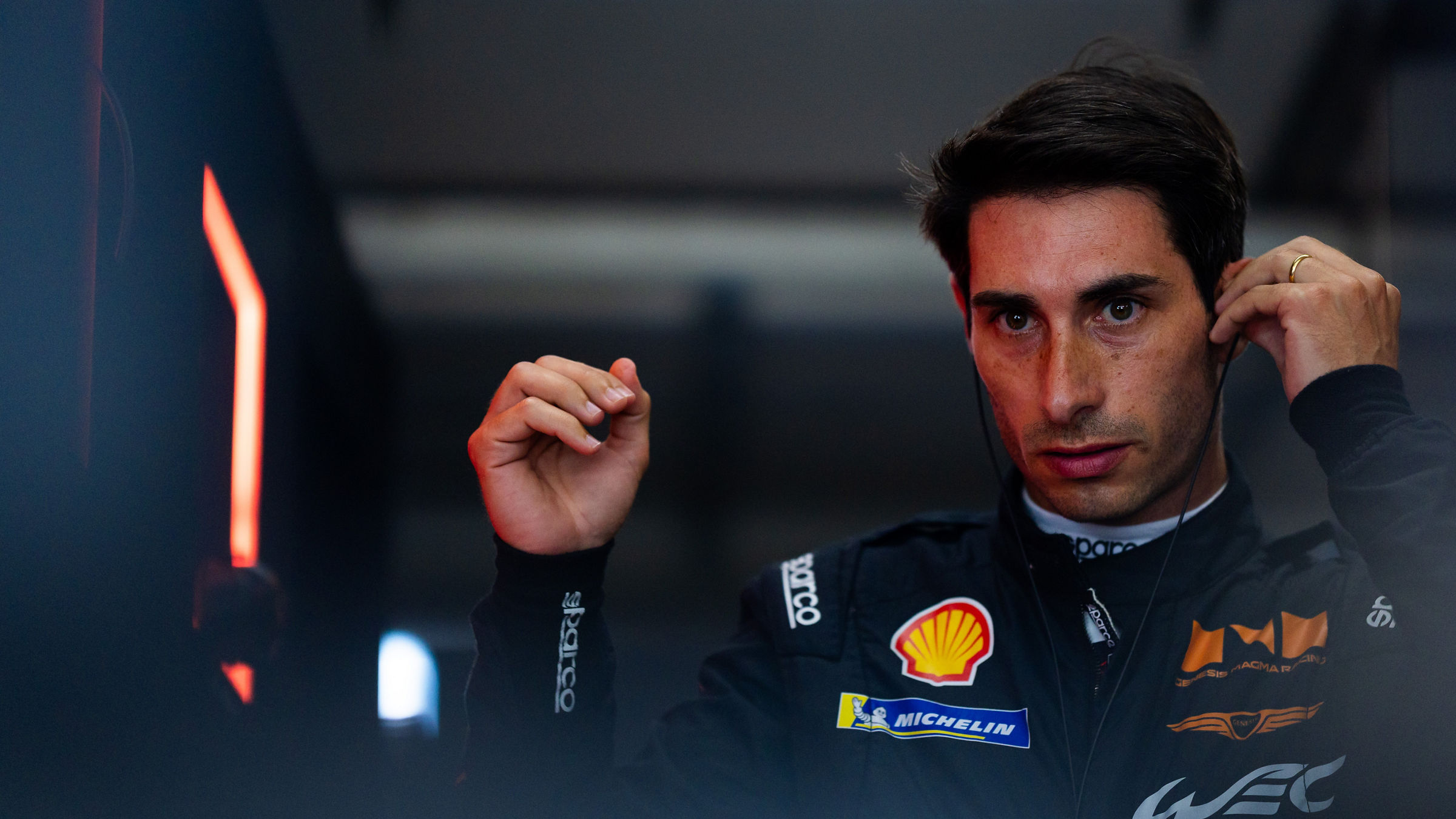 Genesis driver Daniel Juncadella prepares in the garage during WEC competition at COTA.