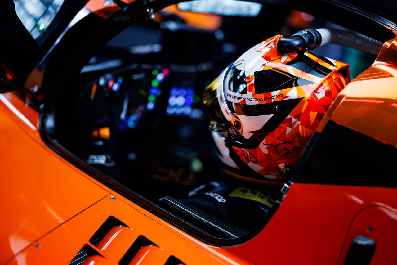 Helmeted driver inside the GMR-001 Hypercar cockpit at WEC Fuji.