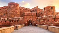 Agra Fort - Historic red sandstone fort of medieval India at sunrise. Agra Fort is a UNESCO World Heritage site in the city of Agra India.; Shutterstock ID 1418597126; purchase_order: -; job: -; client: -; other: -