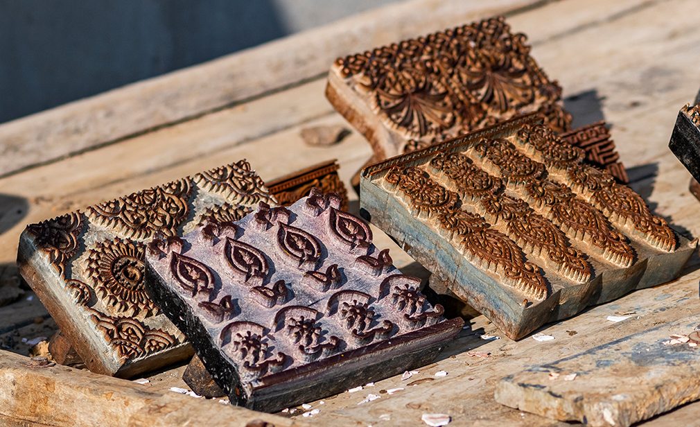 Close up og wooden blocks used in 'Ajrak' printing of cloth in Kutch, Gujarat, India