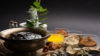 Ayurvedic Chyawanprash is a Powerful  Immunity Booster OR Natural Health Supplement. Served in an Antique bowl with Ingredients, over moody background, selective focus