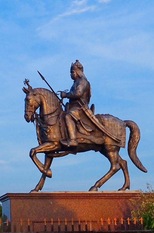 Haldighati, India, October-2018 : Silhouette of Medieval king Maharana pratap bronze statue sitting on horse Chetak depicting iconic Battle of Haldi ghati at Rajasthan, India.