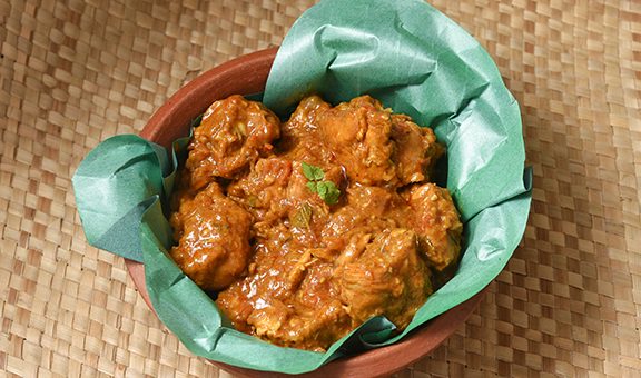 Kerala style chicken masala curry hot and spicy dish of Alappuzha, South India. Popular Indian non vegetarian side dish having thick gravy prepared in coconut milk for Chapati, rice,Appam, Porotta.