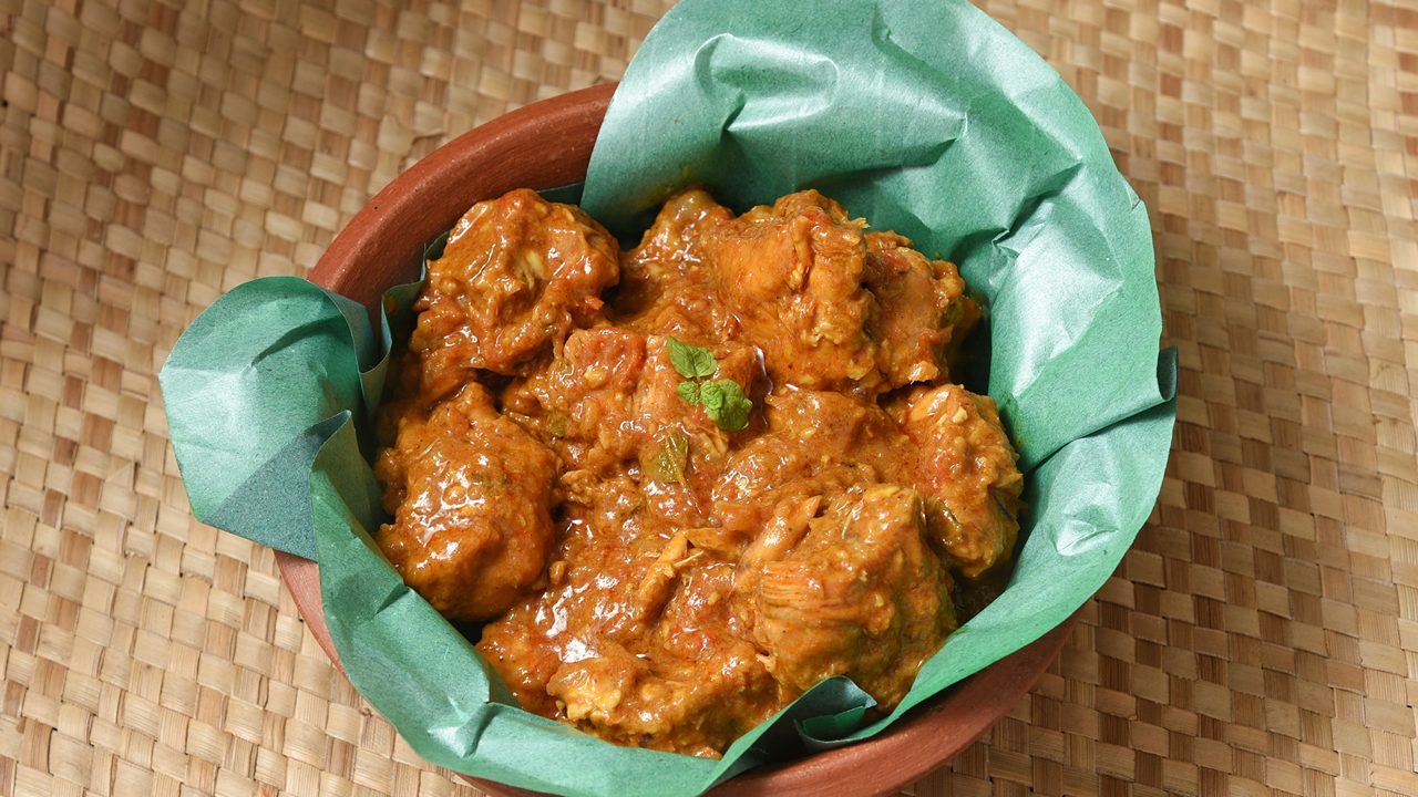 Kerala style chicken masala curry hot and spicy dish of Alappuzha, South India. Popular Indian non vegetarian side dish having thick gravy prepared in coconut milk for Chapati, rice,Appam, Porotta.