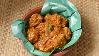 Kerala style chicken masala curry hot and spicy dish of Alappuzha, South India. Popular Indian non vegetarian side dish having thick gravy prepared in coconut milk for Chapati, rice,Appam, Porotta.