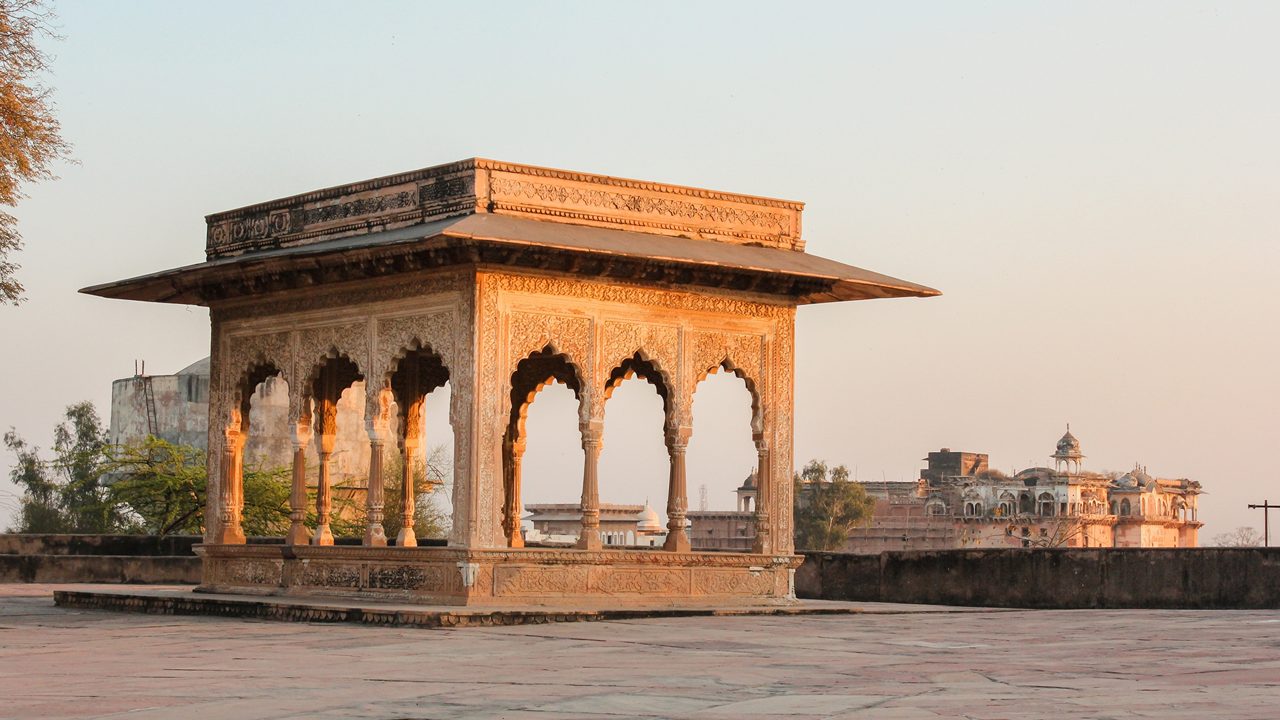 A beautiful ornate pavilion lit by evening light at the ancient Lohagarh fort in Bharatpur in Rajasthan, India.