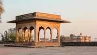 A beautiful ornate pavilion lit by evening light at the ancient Lohagarh fort in Bharatpur in Rajasthan, India.