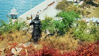 Bronze statue of Hakim Khan Suri, sur (a pathan) holding spear standing near cannon on hillock near Pratap Smarak, a memorial situated at the top of Moti Magri or Pearl Hill in Udaipur City, Rajasthan