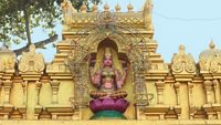 Goddess Lakshmi or Padmavati on the roof of a temple in Tirupati, India.